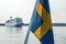 The detail swedish flag hanging on the ferry