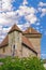 Detail of a tall tower of the castle of Annecy.