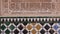Detail of tiles and plaster ornamentation .Patio de los Arrayanes. Comares Palace. Alhambra, Granada, Spain.