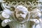 Detail of a tomb column on a graveyard- sculptured head of a little boy