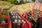 Detail of a tractor in front of hay bales