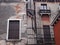 Detail of typical old crumbling house in venice with