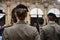 Detail with uniformed women standing during the military ceremony in Bologna