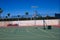 Detail of the university sports courts after classes when they are completely empty. You can see the chairs for the reserves of