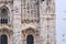 Detail of upper section of the Duomo di Milano with flying birds.