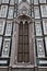 Detail, very light and elaborate, of two twin windows, of the wall of the cathedral Santa Maria del Fiore in Florence.