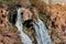 detail view of a Duden waterfall, a water stream breaks from a high cliff - this is a very popular place for tourists and