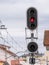 Detail view of a high railway light signal E1 traffic light on a pole giving the upper indication of red color on stop