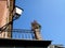 Detail view of italian house with balcony and latern