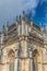 Detail view of the ornate Gothic exterior facade of the Monastery of Batalha, Mosteiro da Batalha, literally the Monastery of the