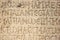 Detail view of Roman inscription on the ruins of Celsus Library in Ephesus.