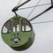 Detail view on a round, colorful Ferris Wheel Cabin with painted panda bear. Located in Amanohashidate View Land, Miyazu, Japan,