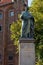 Detail view of the statue of Nicolaus Copernicus at the town hall in the historic city center of Torun