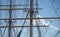 Detail view of the upper masts for the rigging of a large sailing ship, maritim