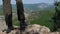 Detail of vintage leather boots and unrecognizable adventurous female hiker