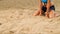 Detail of volleyball female player at the beach. Scene. Close-up of a woman on the sand playing beach volleyball