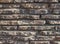 Detail of a wall of thin granite slabs. Texture, background