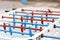 Detail of a white table soccer, foosball, with red and blue players