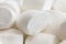 Detail of whole white marshmallows.
