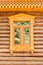 Detail of a window of a traditional wood log house, Vladimir, Golden ring, Russia