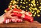 Detail of woman hands holding Christmas gift