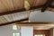 Detail of wood beam ceiling in a modern house entryway