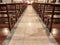 Detail of wooden benches inside a church