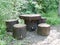 detail of wooden table and seat make with trunk of pine