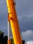 Detail of a yellow heavy-lift crane boom