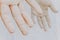 Detail of a young man hand dirty of clay and mud. Selective focus. Abstract and creative photo of human fingerprint