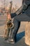 Detail of a young woman with her saxophone