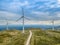 Detailed aerial view, by drone, of a wind turbines on top of mountains