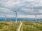 Detailed aerial view, by drone, of a wind turbines on top of mountains