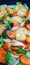 detailed background of tofu with carrots, fish balls and baby pakcoy