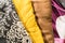 Detailed black, white, yellow, brown and magenta clothes