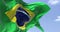 Detailed close up of the national flag of Brazil waving in the wind on a clear day