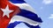 Detailed close up of the national flag of Cuba waving in the wind on a clear day