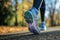 A detailed close-up of a persons running shoes as they exercise on a treadmill, capturing the active motion of their workout, A