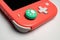 Detailed close up photo of Coral Nintendo Switch Lite