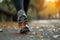 A detailed, close-up shot of a persons running shoes covered in mud after a vigorous run, A runner\\\'s graphically displayed