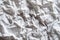 Detailed close up view of wrinkled and crumpled white paper, A crumpled paper texture with deep wrinkles and uneven bumps