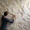 Detailed Feather Rendering Woman Creating Floral Wall Mural With Grandeur Of Scale