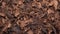 Detailed Foliage And Textural Surface: Brown Wooden Chipped Mulch Background