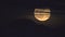 Detailed full moon rising over mountain clouds Iceland time lapse