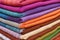 detailed image of multicolored espadrille fabrics stacked up