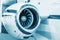 Detailed insigh tturbine blades of an aircraft jet engine, colored technical blue, business jet engine close up high detailed view