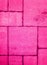 Detailed pavement pattern toned in bright pink