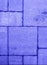 Detailed pavement pattern toned in electric blue