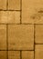 Detailed pavement pattern toned in honey dijon