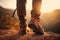 Detailed shot of hiker boots walking on a mountain trail at sunset. The image captures the spirit of adventure and exploration. Ai